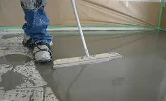 Uneven floor being professionally repaired in Jersey City, NJ